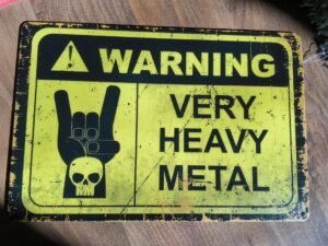 Heavy metal peltkilpi